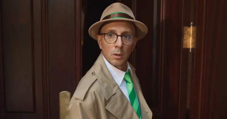 Steve Burns smiling warmly in a casual outfit, reflecting his iconic persona from Blue’s Clues and his enduring connection with fans.