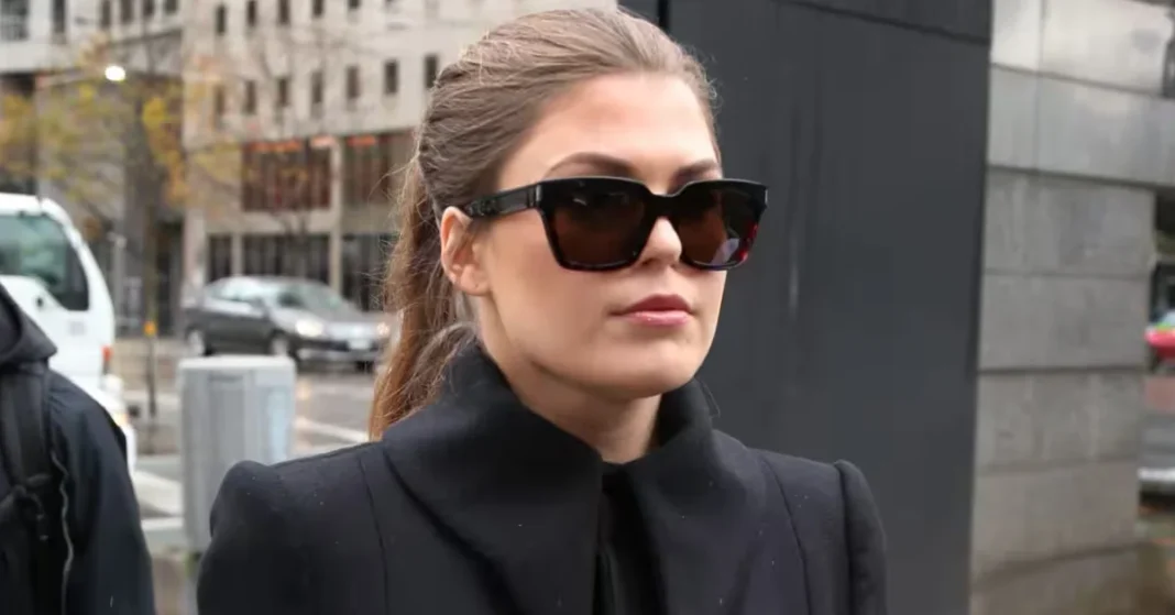 Belle Gibson smiling portrait in natural light, wellness influencer and author
