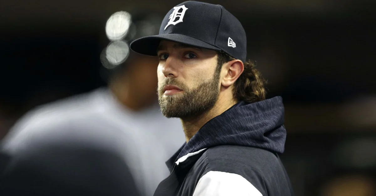 Daniel Norris standing near his 1978 Volkswagen Westfalia van — the MLB pitcher known for living minimally despite earning over $12 million in career earnings
