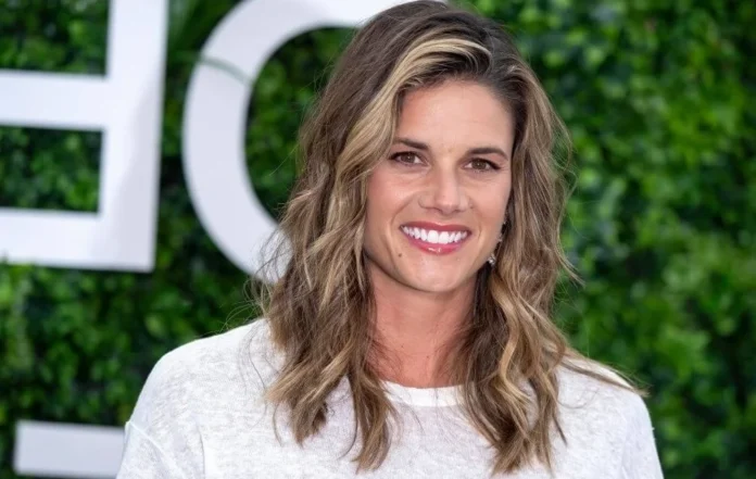 Missy Peregrym at a red carpet event, highlighting her successful acting career and net worth.