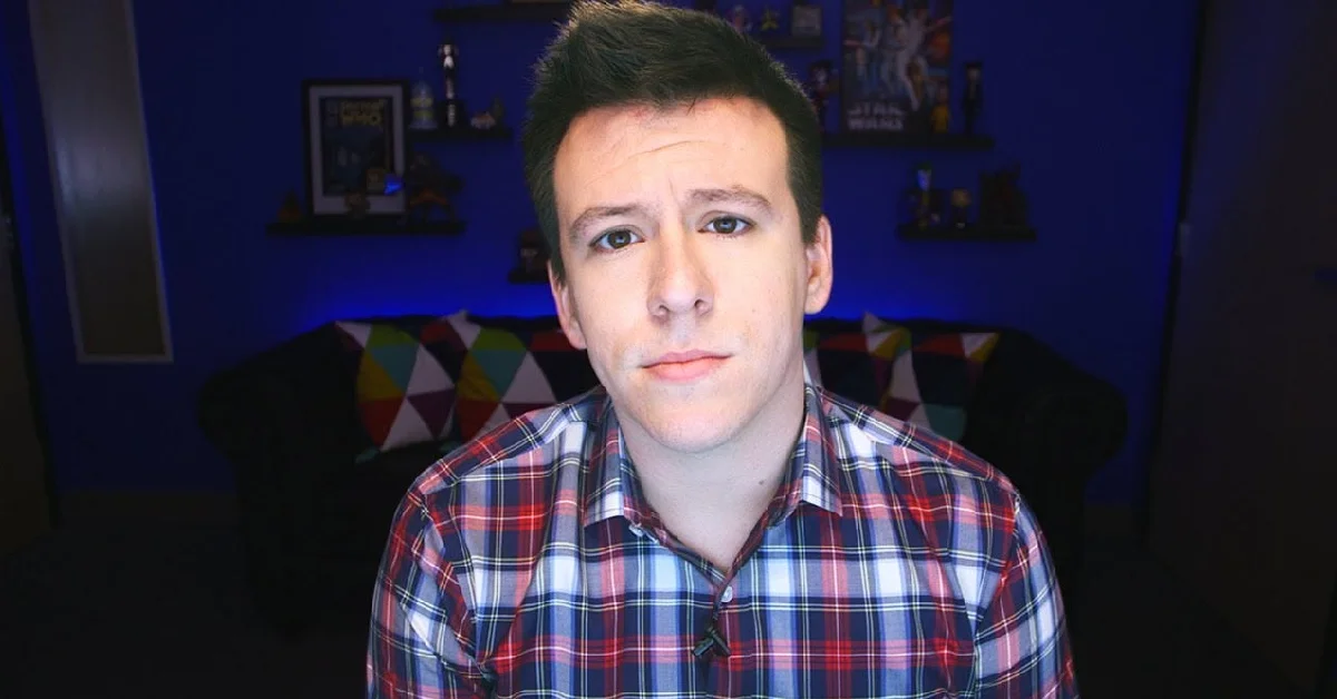 Philip DeFranco smiling on camera, representing his estimated $16 million net worth built through YouTube, Patreon, and real estate investments