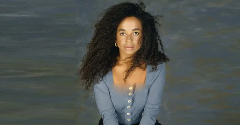 Maxine Sneed smiling outdoors with natural background