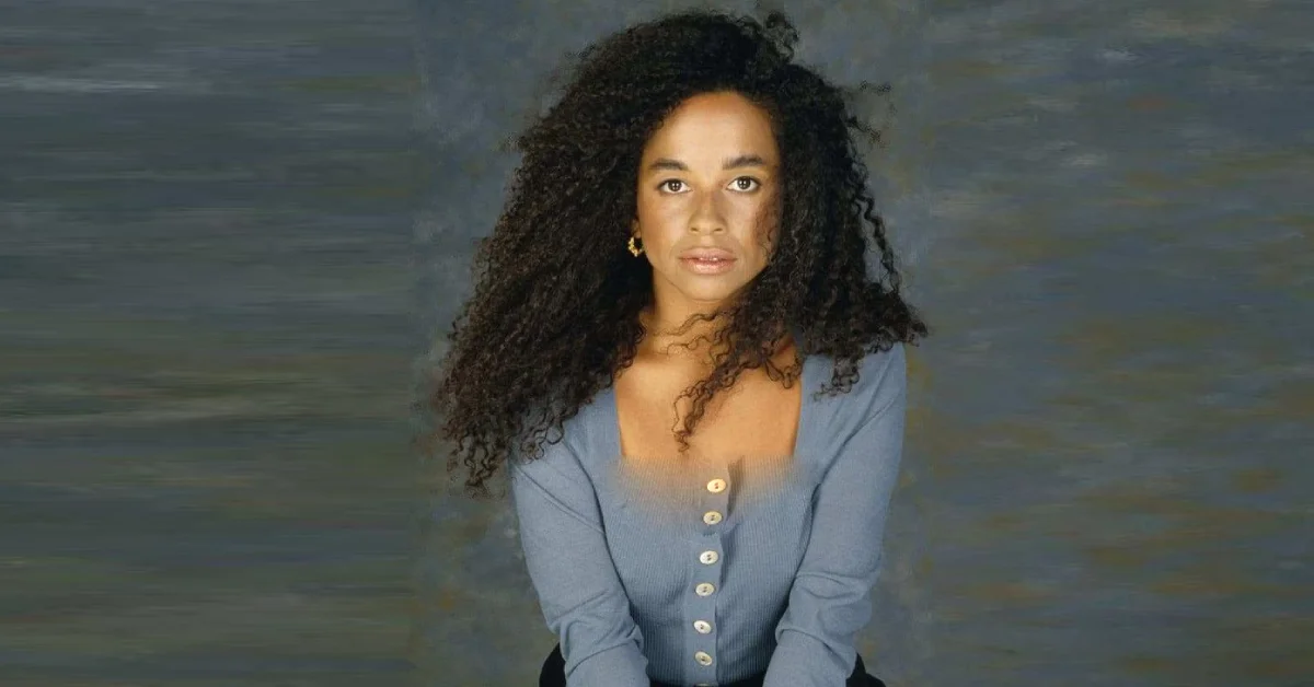 Maxine Sneed smiling outdoors with natural background