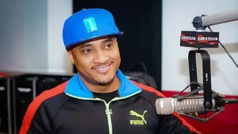 DJ Quicksilva posing at a live DJ event, representing his career success and lifestyle connected to DJ Quicksilva Net Worth.