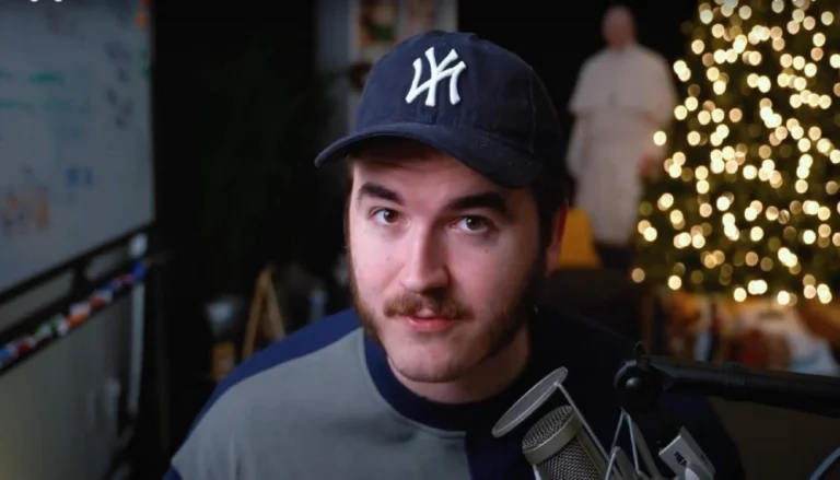Jschlatt posing with luxury car and streaming gear, symbolizing jschlatt net worth and his rise as a top YouTuber and Twitch creator in 2025.