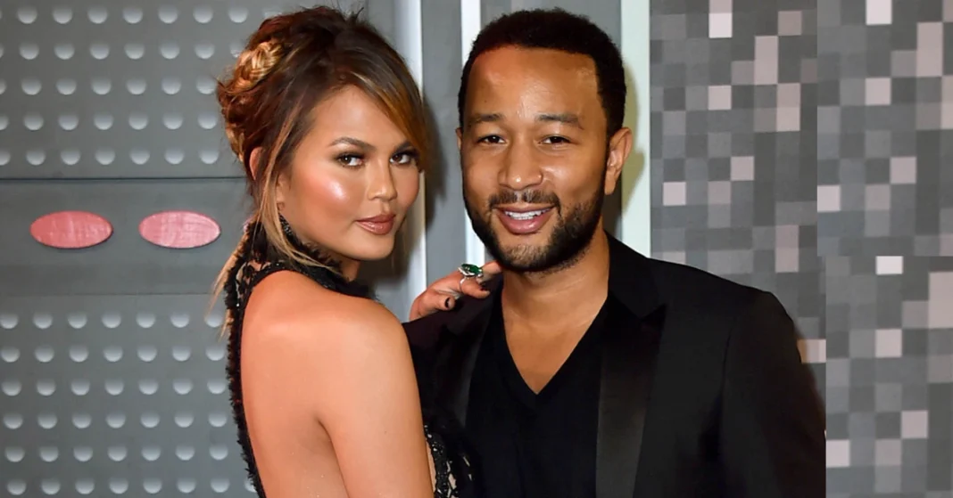 Photo of John Legend Wife Chrissy Teigen smiling on the red carpet, highlighting her elegance and warm personality.