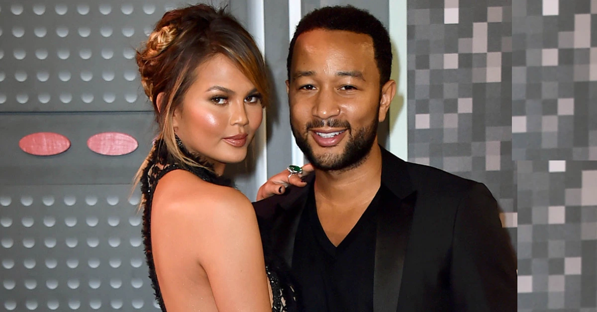 Photo of John Legend Wife Chrissy Teigen smiling on the red carpet, highlighting her elegance and warm personality.