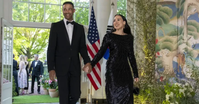 Meena Harris with her husband smiling together, representing their strong relationship and family bond — Meena Harris Husband.