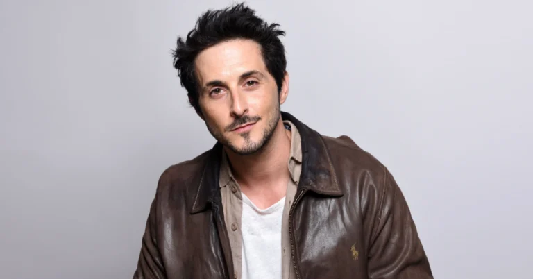Portrait of Tomer Capone, the Israeli actor recognized for his breakout role as Frenchie in The Boys, highlighting his career journey and global success.