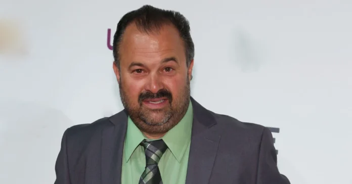 Frank Fritz smiling during an appearance on American Pickers, highlighting his journey, career, and personal story.