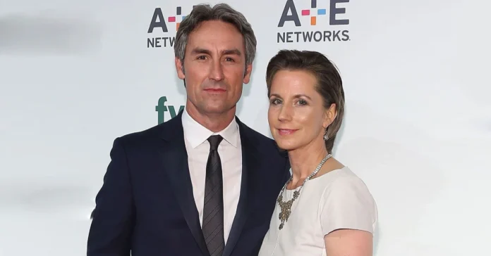 Jodi Faeth smiling beside Mike Wolfe at a public event, capturing Jodi Faeth’s quiet presence and connection to the American Pickers star.