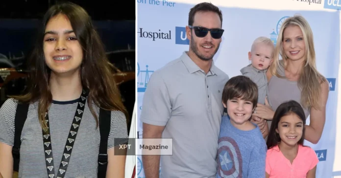 Ava Lorenn Gosselaar smiling alongside her family, showcasing her charm and connection to Hollywood through her father, actor Mark-Paul Gosselaar.