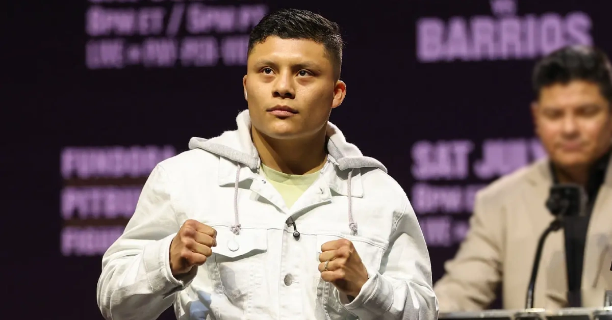 Isaac Pitbull Cruz in boxing stance, representing his net worth and career earnings as a super lightweight champion