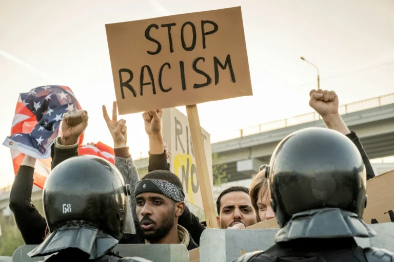 Employment lawyer in New Jersey reviewing a workplace discrimination case with a client