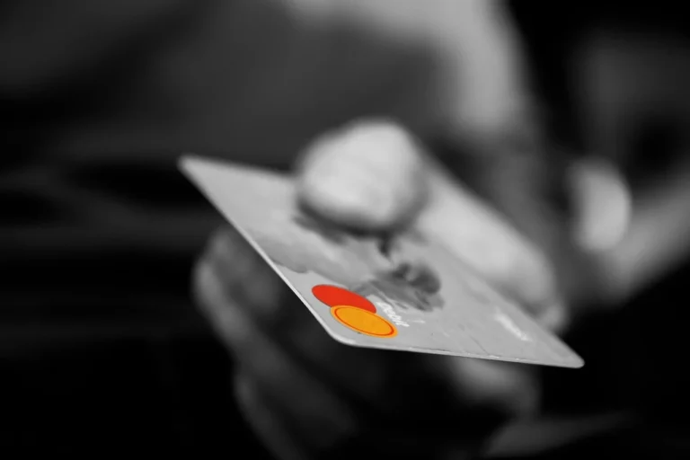High-risk business owner reviewing payment processing approval documents